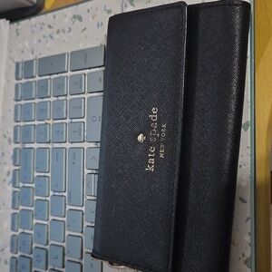 Kate Spade Black Wristlet with Gold Accents